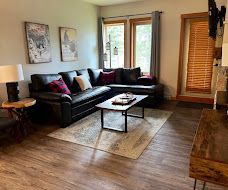Tidy living room with vacuumed rug and floors